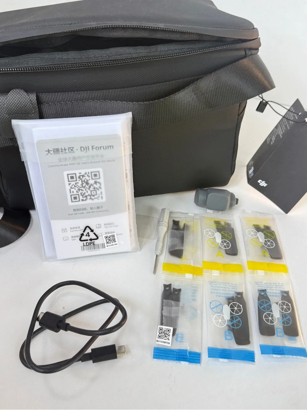 DJI Black Camera/Accessory Carry Bag with Propellers & Cable